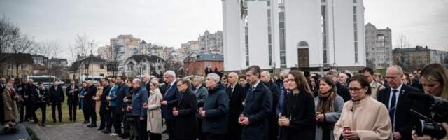 Глава МИД Литвы и коллеги по ЕС почтили память жертв в Буче