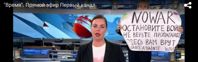 В прямой эфир программы "Время" ворвалась девушка с антивоенным плакатом