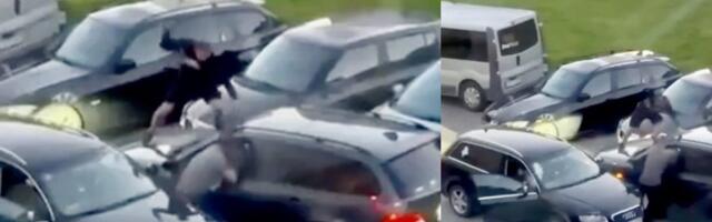 ВИДЕО | В Литве сняли на видео пожарного и его друга, избивших водителя BMW и повредивших его автомобиль