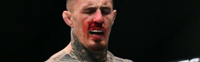 ВИДЕО | Кровавые кадры: титульный бой UFC в тяжёлом весе закончился скандалом в первом раунде. „Я ничего не вижу“